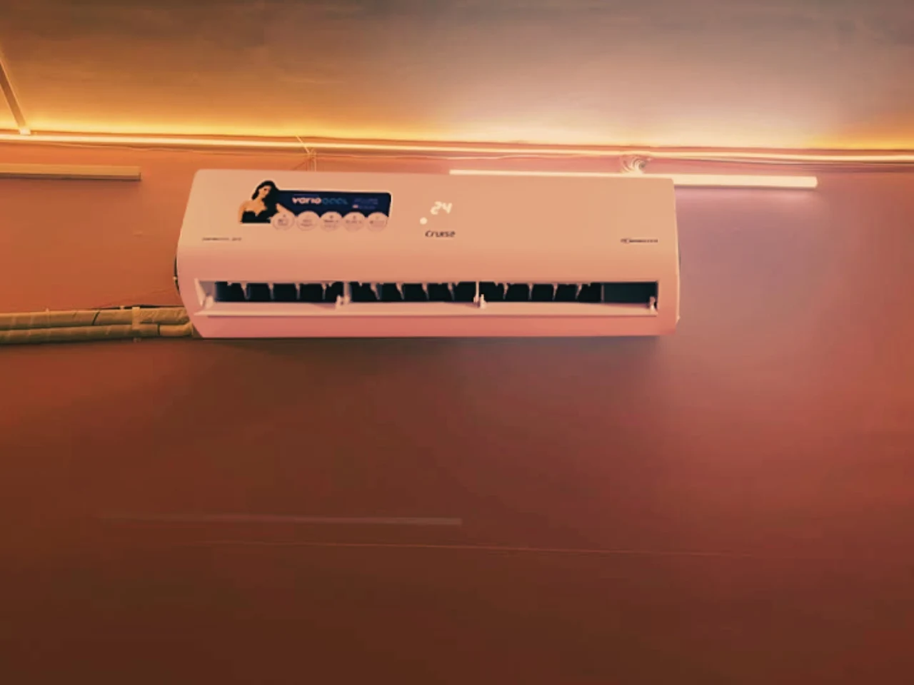 Wall-mounted installation of Cruise CWCVBK‑VQ3D185 indoor AC unit maintaining 24 °C temperature and  showing aligned mounting, proper spacing, and concealed pipe routing