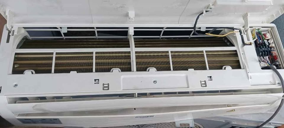 IFB 1.5 Ton 5 Star inverter AC (CI185SS22RGN1) indoor unit with front panel open, showing air filter mesh and cooling coil