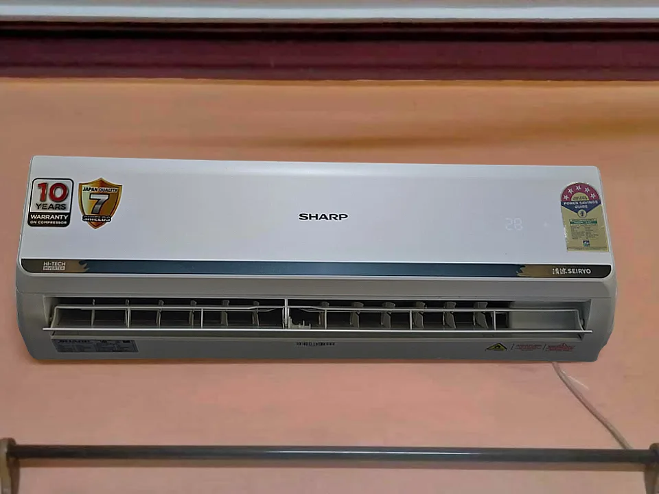 SHARP 1.5 ton 5 star split AC (SI18V5B-GC) indoor unit with front air flap open showing airflow louvers